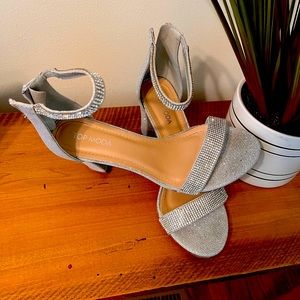 Size 9 strappy heels. Silver.